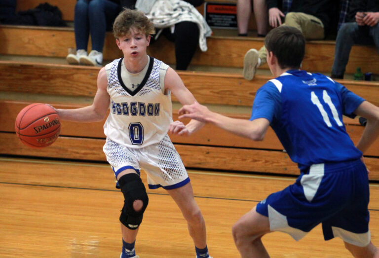 Olivers lead Hodgdon boys, girls to opening hoop victories The County